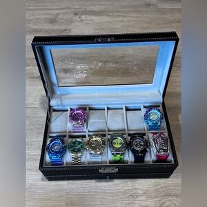 Assortment of watches and watch box